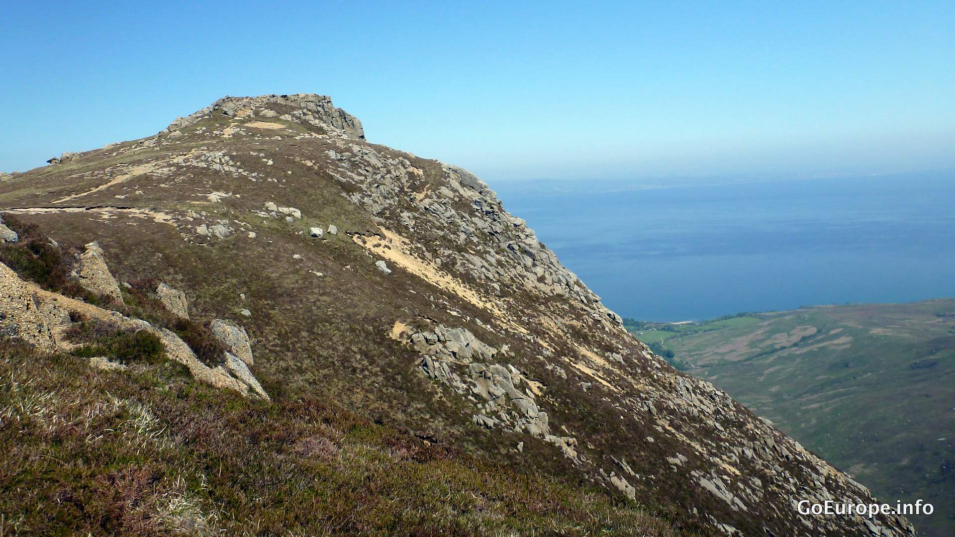 A wide mountain panorama from a high trail on the Isle of Arran.