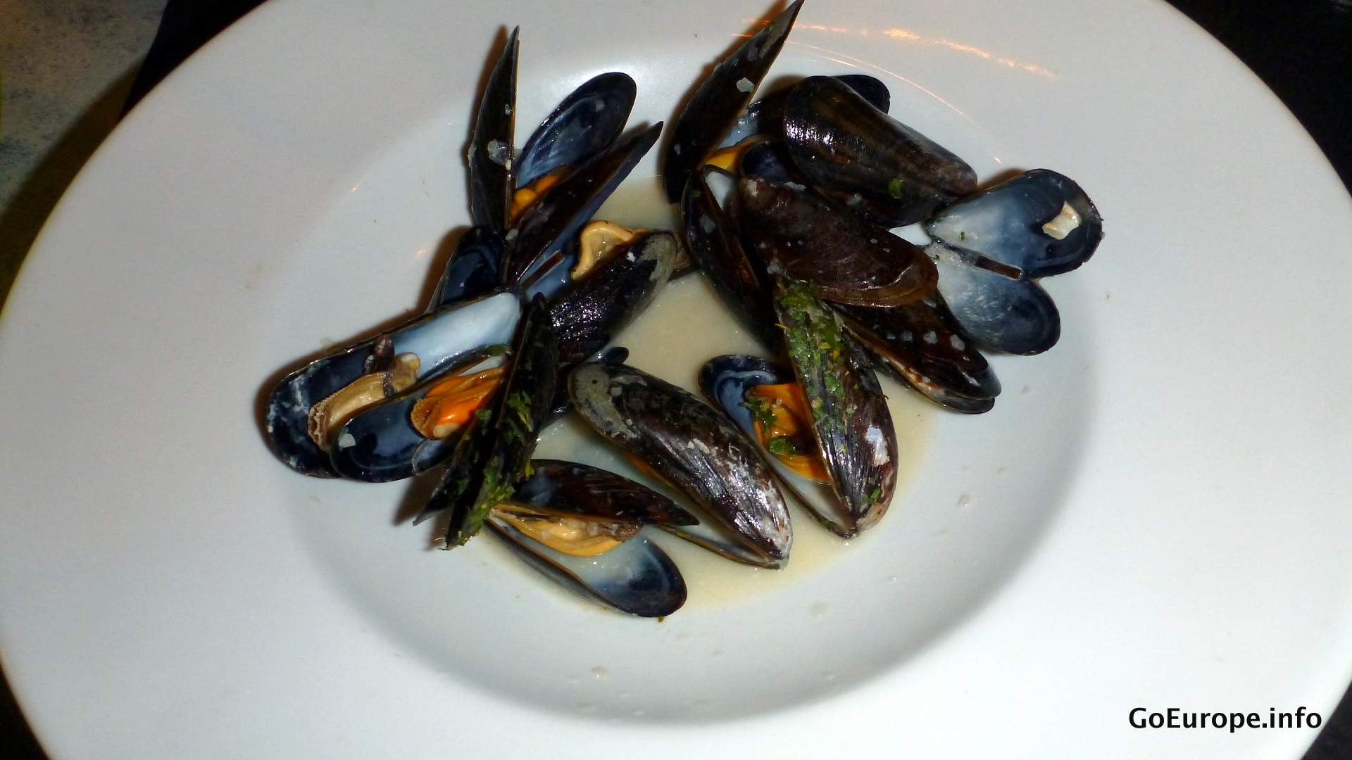 Eat some mussels and have some Wine.